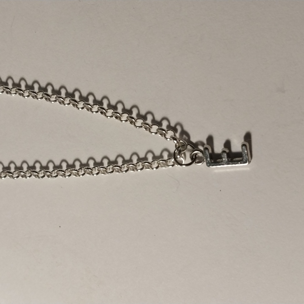 Silver letter E charm necklace